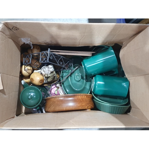 290 - Two boxes containing green pottery Dishes, wooden Bowls, wooden Fruit, plated Cutlery, framed Prints... 