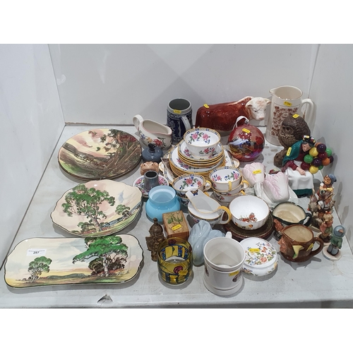 297 - Aynsley teaware, a Melba ware model of a Hereford Bull, a Royal Doulton 'The Old Balloon Seller' Fig... 