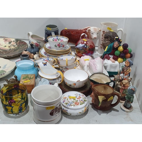 297 - Aynsley teaware, a Melba ware model of a Hereford Bull, a Royal Doulton 'The Old Balloon Seller' Fig... 