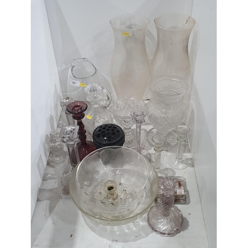 323 - A selection of glassware including a large pair of Vases, a cut glass Pedestal Vase, a Jug, Candlest... 