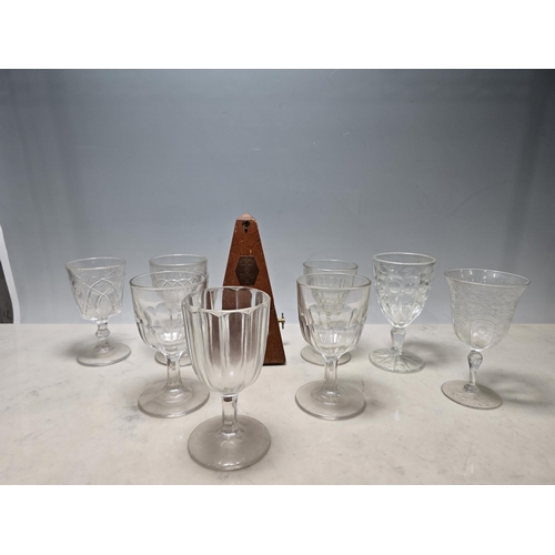 326 - Eight various moulded Wine Glasses and a Metronome, (R4)