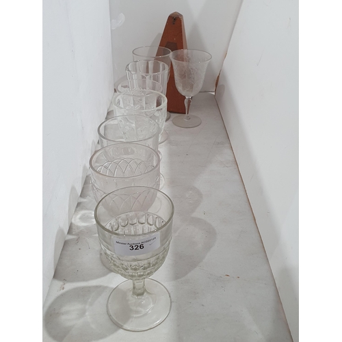 326 - Eight various moulded Wine Glasses and a Metronome, (R4)