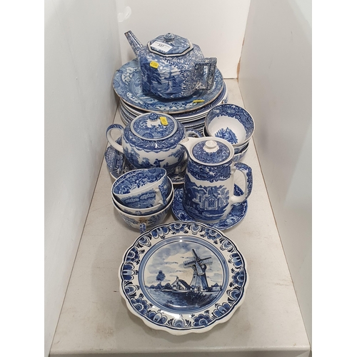 337 - A selection of blue and white pottery including a Teapot, Plates, Sucrier, a musical Windmill Plate,... 