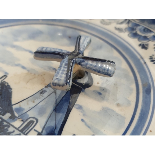 337 - A selection of blue and white pottery including a Teapot, Plates, Sucrier, a musical Windmill Plate,... 