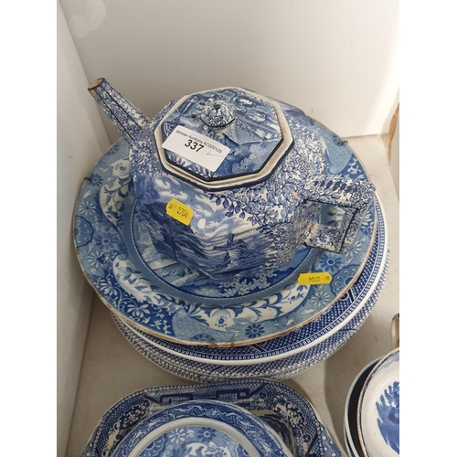 337 - A selection of blue and white pottery including a Teapot, Plates, Sucrier, a musical Windmill Plate,... 