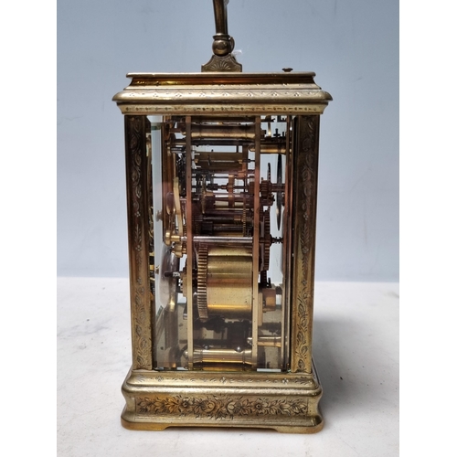 348 - **WITHDRAWN**A brass cased repeater Carriage Clock, the rectangular enamel dial inscribed L. Vrard &... 