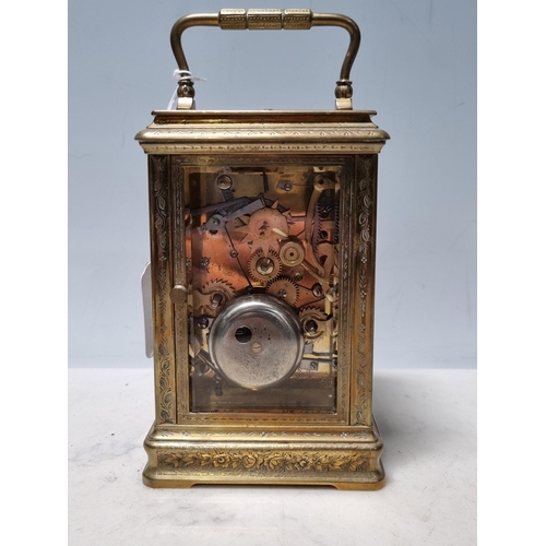 348 - **WITHDRAWN**A brass cased repeater Carriage Clock, the rectangular enamel dial inscribed L. Vrard &... 