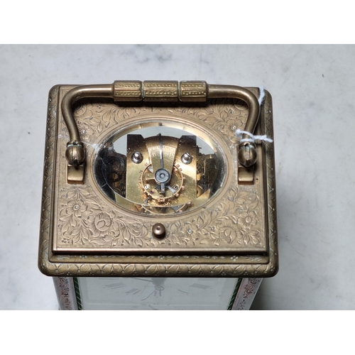 348 - **WITHDRAWN**A brass cased repeater Carriage Clock, the rectangular enamel dial inscribed L. Vrard &... 