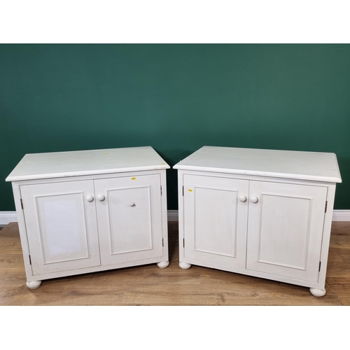 410 - A pair of modern white painted two door Cupboards on bun feet 3ft W x 2ft 4in H (R3)