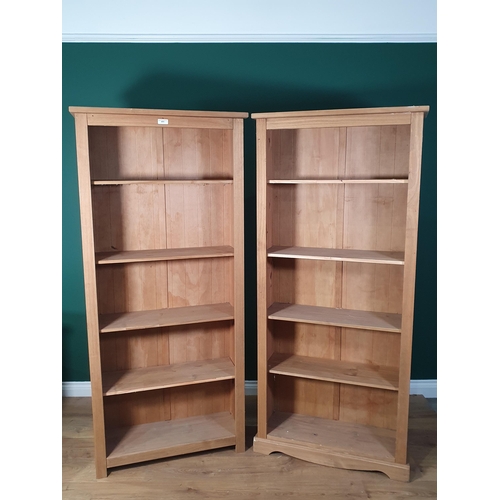 411 - A pair of modern pine open Bookcases and another Bookcase (R2)