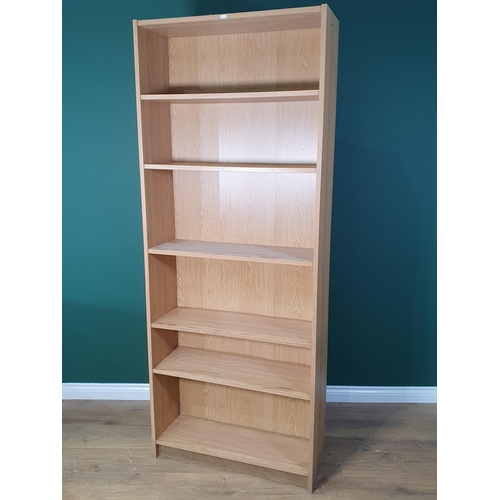 411 - A pair of modern pine open Bookcases and another Bookcase (R2)