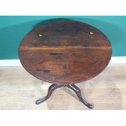 412 - A Georgian mahogany Tripod Table on turned column and tripod base 2ft 6in D x 2ft 4in H and a Victor... 