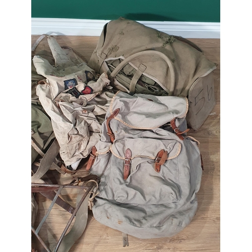 421 - Five assorted canvas Rucksacks with metal frameworks, etc. (R3).