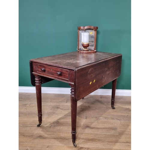 422 - A 19th Century mahogany Pembroke Table fitted end drawer raised on turned supports and casters 3ft W... 