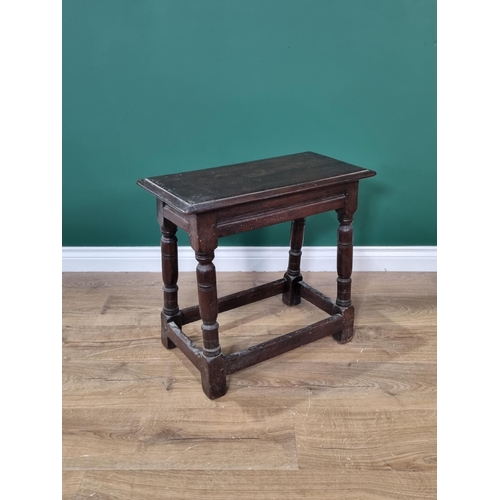 425 - An oak Joint Stool with moulded top on turned supports 1ft 11in W x 1ft 9in H (R3)