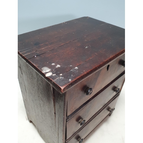 428 - A 19th Century mahogany veneered Apprentice Chest of three long drawers 10in H x 8in W (R3)