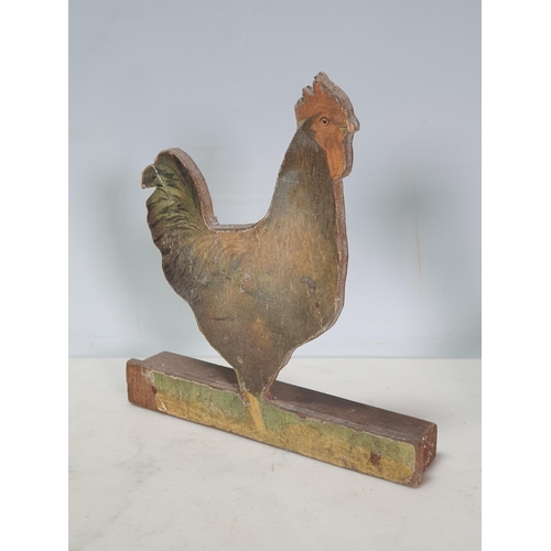 436 - A pig shaped Chopping Board, a cut out painted Cockerel and a carved wooden Goose (R2)