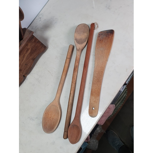 44 - An antique oak Spoon Rack containing a collection of Wooden Spoons (R2)