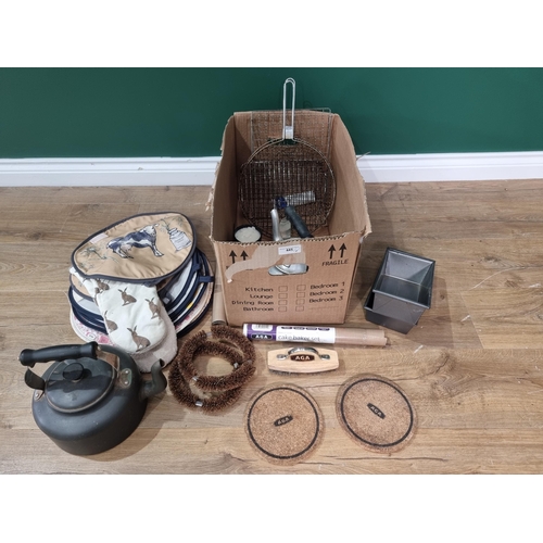 445 - Two AGA Kettles, an AGA Wire Brush, two AGA Cork circular Stands, two rolls of AGA Bake-O-Slide, a p... 