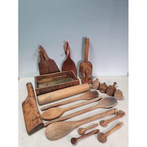 448 - A wooden box containing Pastry Cutters, Butter Pats, Spoons, Rolling Pin, etc, (R6)