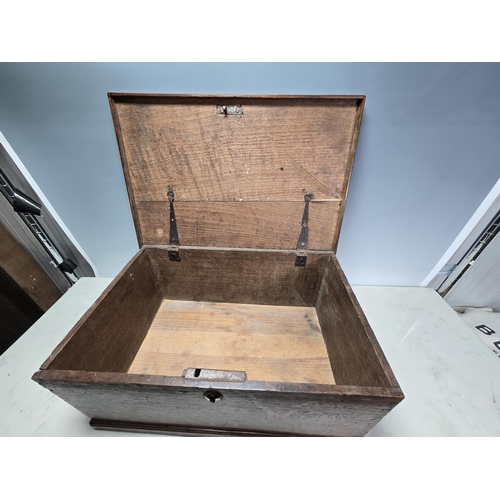 45 - An antique oak Box with hinged cover, 18in W, and a mahogany Writing Slope, A/F, 10in, (R3)