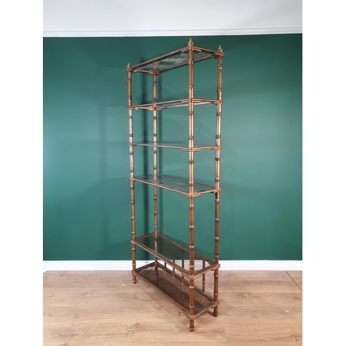 451 - A gilt painted simulated bamboo set of Shelves with glass shelves, 6ft 6in H x 2ft 9in W x 12in D, (... 