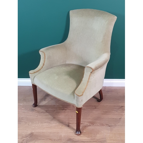 457 - A 19th Century mahogany and green upholstered Armchair on turned supports, the back legs having cast... 