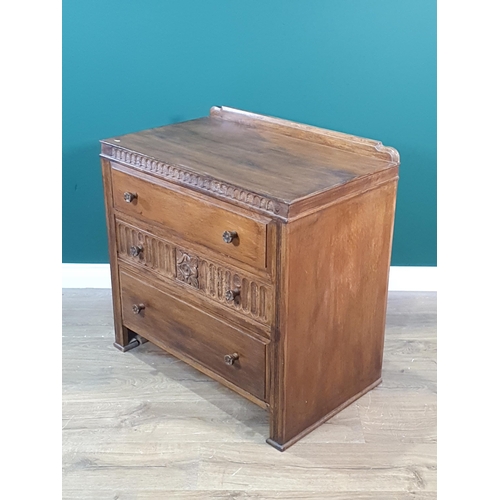 458 - An oak Chest of three drawers with carved decoration, 2ft 7in W, (R6)