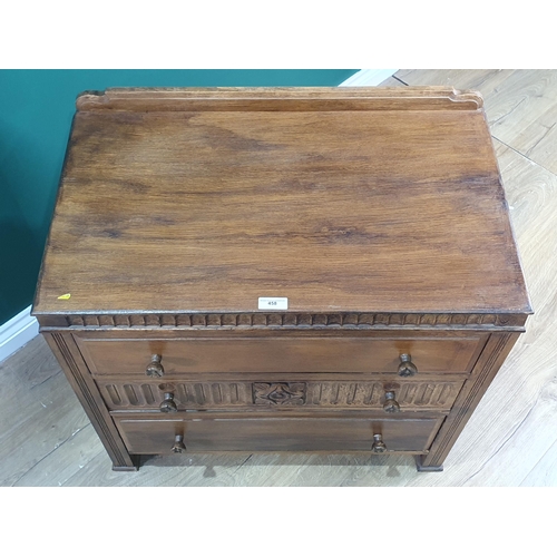 458 - An oak Chest of three drawers with carved decoration, 2ft 7in W, (R6)