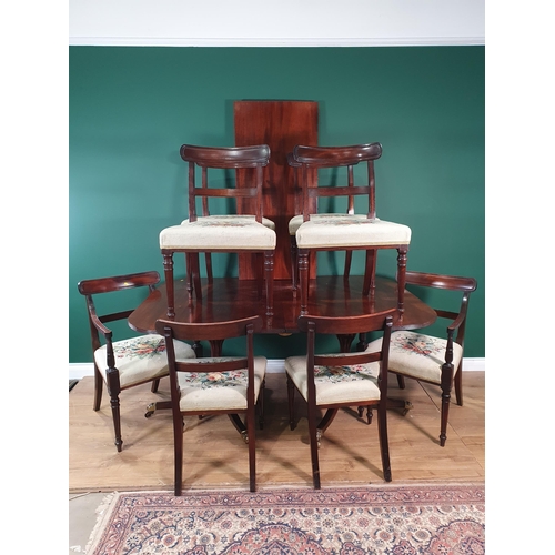 462 - A 19th Century mahogany twin pedestal extending Dining Table with rounded rectangular top, including... 