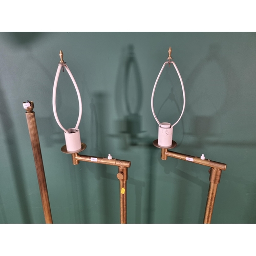 486 - A pair of adjustable brass Standard Lamps with marble bases, an Anglepoise Lamp and another brass St... 