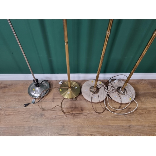 486 - A pair of adjustable brass Standard Lamps with marble bases, an Anglepoise Lamp and another brass St... 