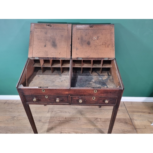 491 - An antique oak Desk with double hinged sloping front fitted two drawers on squared supports, 3ft 6in... 