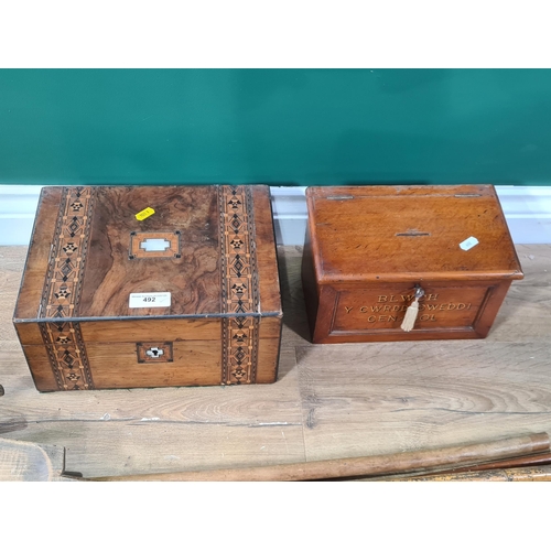 492 - An oak Offertory Box containing a selection of wooden knobs, 10in W, a Victorian walnut and parquetr... 