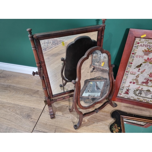 518 - A framed Sampler, three Toilet Mirrors, an ebonised Wall Mirror and a rectangular Wall Mirror contai... 