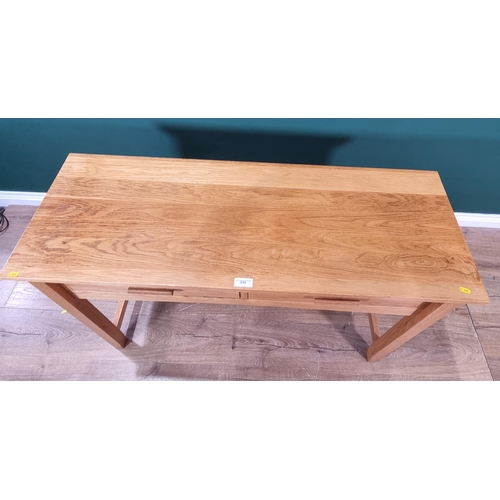 535 - An modern oak Side Table fitted two drawers on squared supports and stretchers, 3ft 11in W x 2ft 6in... 