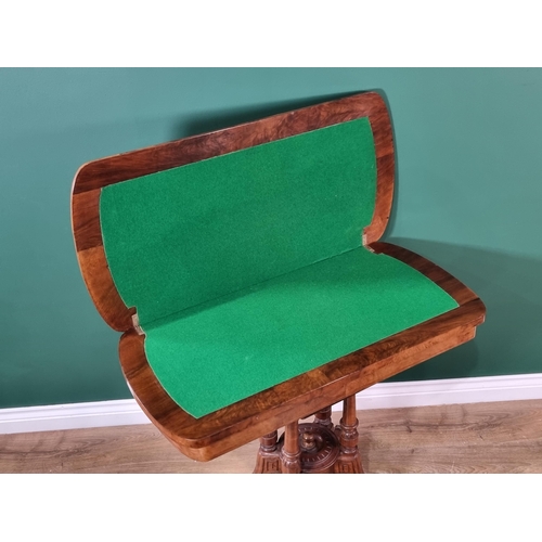 537 - A Victorian walnut foldover Card Table with crossbanded top on turned supports and quadruple base, (... 