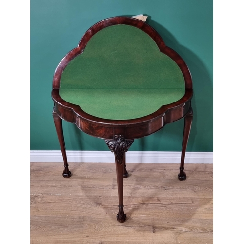 541 - A Georgian style mahogany shaped foldover Card Table with beaded edge, carved slender cabriole suppo... 