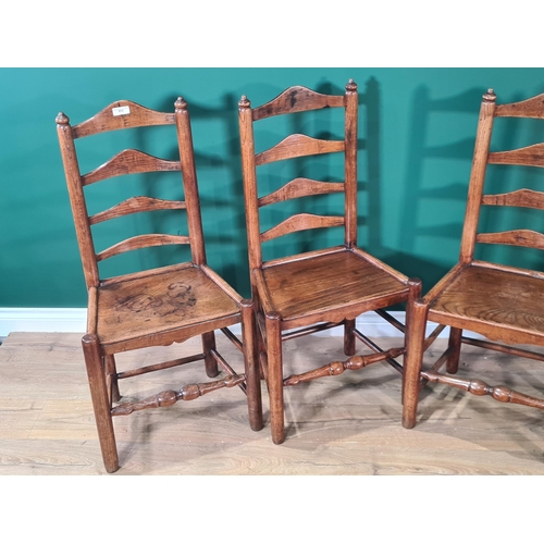 553 - A set of four antique Clun ash Chairs with shaped ladder backs on turned supports and stretchers, (R... 