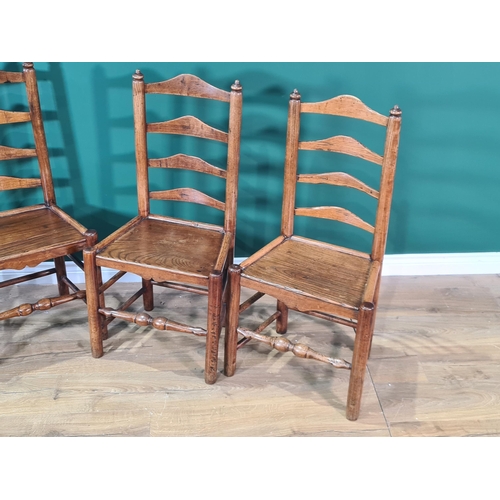 553 - A set of four antique Clun ash Chairs with shaped ladder backs on turned supports and stretchers, (R... 