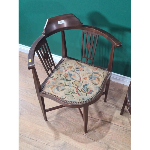 555 - An Edwardian mahogany Elbow Chair with needlework seat on turned supports, and another Chair of simi... 