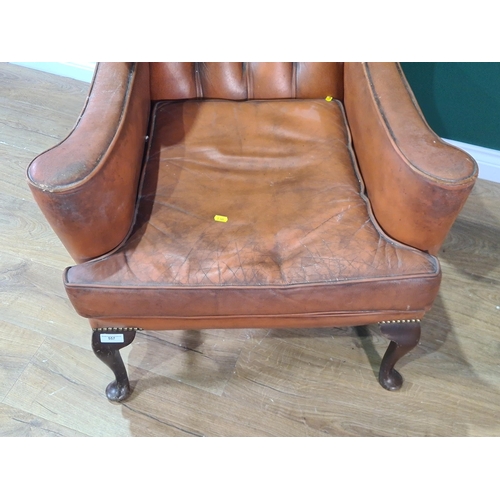 557 - A button upholstered Library Chair on cabriole front supports and turned stretchers, (R7)