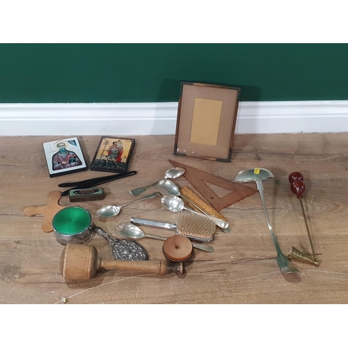 570 - A small box of collectables to include treen glove stretchers, a masher, dressing table items, etc; ... 