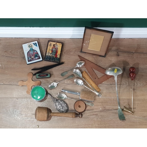 570 - A small box of collectables to include treen glove stretchers, a masher, dressing table items, etc; ... 