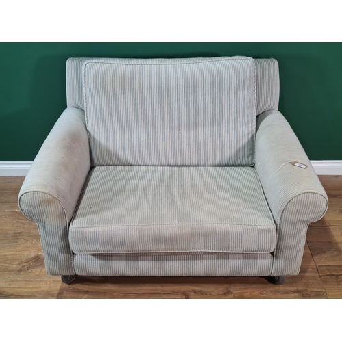 579 - An upholstered Love Seat with later caster front supports, 4ft 3in W, (R7)