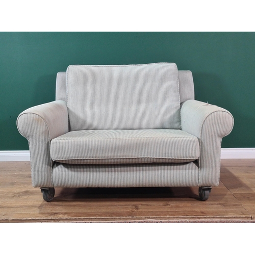 579 - An upholstered Love Seat with later caster front supports, 4ft 3in W, (R7)