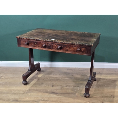 580 - A 19th Century mahogany and coromandel crossbanded Library Table fitted two frieze drawers on cheval... 