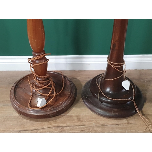 584 - Two wooden Standard Lamps, failed PAT, (R7)