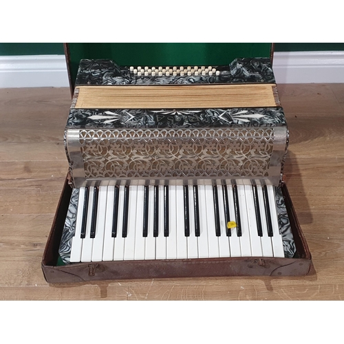 588 - A cased Piano Accordion, (R7)