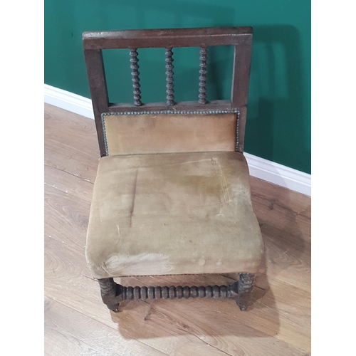 594 - An antique oak single Chair with bobbin spindle back and upholstered seat, A/F, (R8)